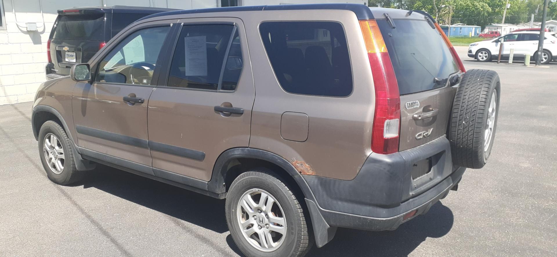 2004 Honda CR-V (JHLRD78854C) with an 2.4L L4 DOHC 16V engine, 4-Speed Automatic Overdrive transmission, located at 2015 Cambell Street, Rapid City, SD, 57701, (605) 342-8326, 44.066433, -103.191772 - CARFAX AVAILABLE - Photo#2